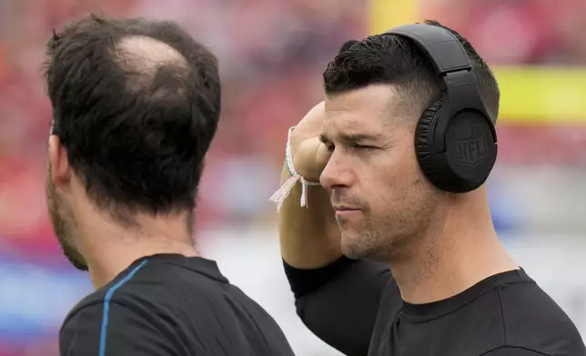 Carolina Panthers head coach Dave Canales watches against the Tampa Bay Buccaneers during the first half of an NFL football game Sunday, Dec. 29, 2024, in Tampa, Fla. (AP Photo/Chris O'Meara)