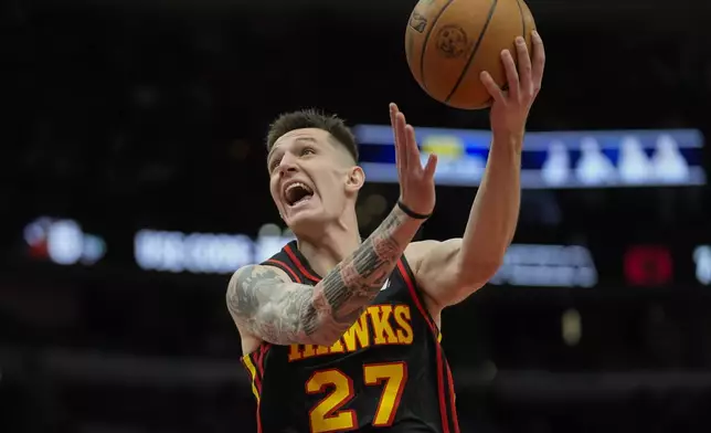 Atlanta Hawks guard Vit Krejci (27) goes up for a shot during the first half of an NBA basketball game against the Chicago Bulls, Wednesday, Jan. 15, 2025, in Chicago. (AP Photo/Erin Hooley)