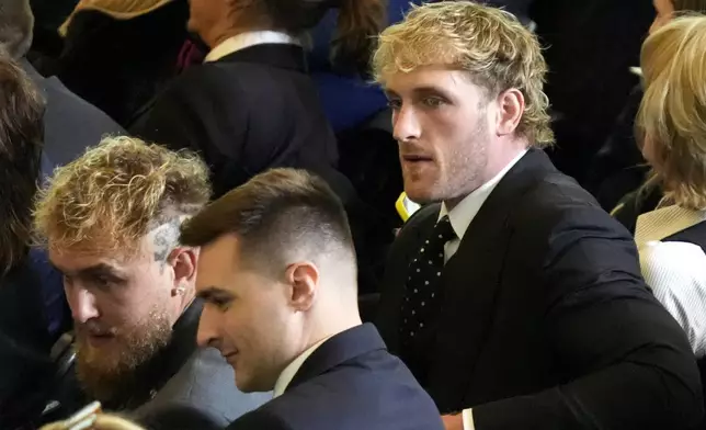 Logan Paul, right, and Jake Paul appear in Emancipation Hall at the 60th Presidential Inauguration, Monday, Jan. 20, 2025, at the U.S. Capitol in Washington. (Jasper Colt/Pool Photo via AP)