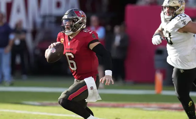 Tampa Bay Buccaneers quarterback Baker Mayfield (6) carries on a 27-yard run during the second half of an NFL football game against the New Orleans SaintsSunday, Jan. 5, 2025, in Tampa, Fla. (AP Photo/Chris O'Meara)