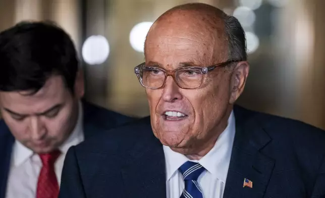 Rudy Giuliani speaks to the media outside of Manhattan federal court in New York, on Friday, Jan. 3, 2025. (AP Photo/Adam Gray)