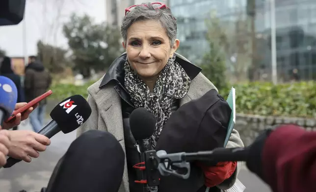 Dominique Pelicot 's lawyer Beatrice Zavarro answers reporters outside the Nanterre courthouse where the convicted rapist who horrified France by drugging his then wife, Gisele Pélicot, so other men could rape her, is now caught up in other cases, Thursday, Jan. 30, 2025 in Nanterre, outside Paris. (AP Photo/Thomas Padilla)