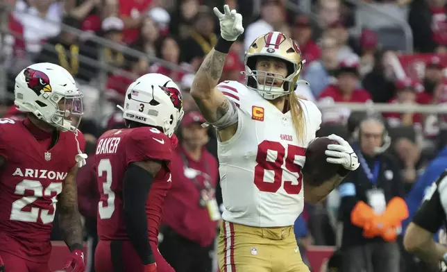 San Francisco 49ers tight end George Kittle (85) celebrates after a play against the Arizona Cardinals during the first half of an NFL football game in Glendale, Ariz., Sunday, Jan. 5, 2025. (AP Photo/Rick Scuteri)