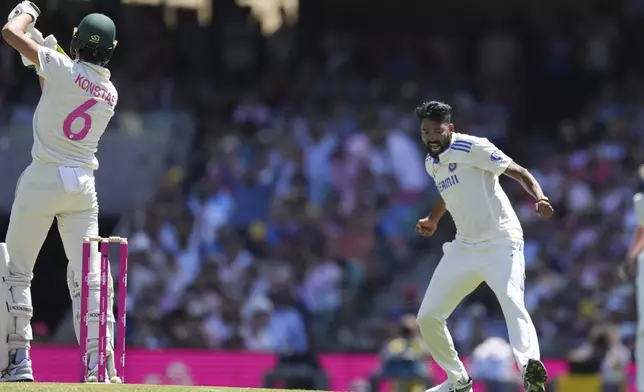 India's Mohammed Siraj reacts after talking the wicket of Australia's Sam Konstas during play on the second day of the fifth cricket test between India and Australia at the Sydney Cricket Ground, in Sydney, Australia, Saturday, Jan. 4, 2025. (AP Photo/Mark Baker)