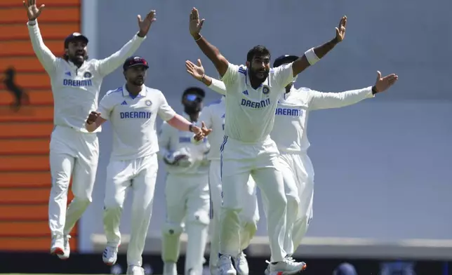 India's Jasprit Bumrah appeals successfully for the wicket of Australia's Marnus Labuschagne during play on the second day of the fifth cricket test between India and Australia at the Sydney Cricket Ground, in Sydney, Australia, Saturday, Jan. 4, 2025. (AP Photo/Mark Baker)