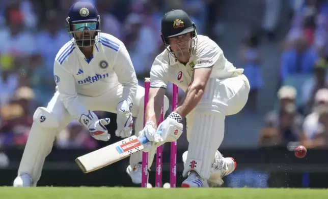 Australia's Beau Webster bats during play on the second day of the fifth cricket test between India and Australia at the Sydney Cricket Ground, in Sydney, Australia, Saturday, Jan. 4, 2025. (AP Photo/Mark Baker)