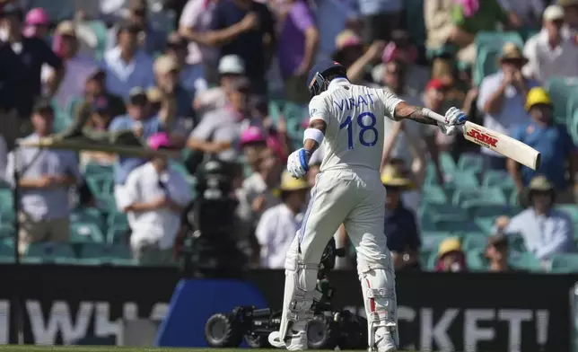 India's Virat Kohli reacts as he walks from the field after he was dismissed during play on the second day of the fifth cricket test between India and Australia at the Sydney Cricket Ground, in Sydney, Australia, Saturday, Jan. 4, 2025. (AP Photo/Mark Baker)