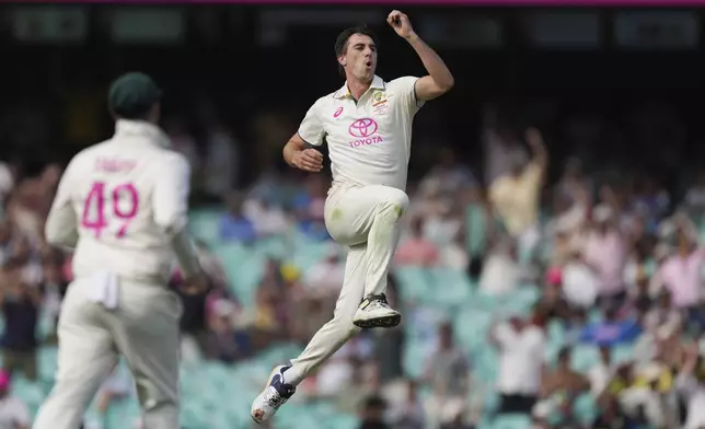 Australia's captain Pat Cummins celebrates after taking the wicket of India's Rishabh Pant during play on the second day of the fifth cricket test between India and Australia at the Sydney Cricket Ground, in Sydney, Australia, Saturday, Jan. 4, 2025. (AP Photo/Mark Baker)