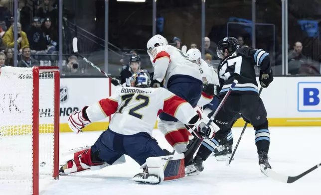 Florida Panthers goaltender Sergei Bobrovsky (72) saves the puck from the shot against the Utah Hockey Club during the first period of an NHL hockey game, Wednesday, Jan. 8, 2025, in Salt Lake City. (AP Photo/Melissa Majchrzak)