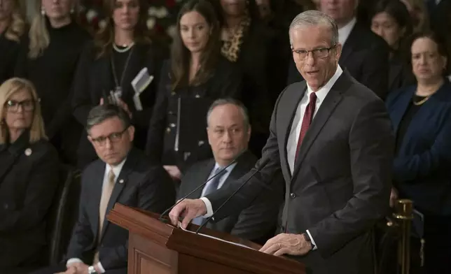 Senate Majority Leader John Thune delivers a eulogy for former President Jimmy Carter as he lies in state during a ceremony in the Capitol, Tuesday, Jan. 7, 2025, in Washington. Carter died Dec. 29 at the age of 100. (Ricky Carioti/The Washington Post via AP, Pool)