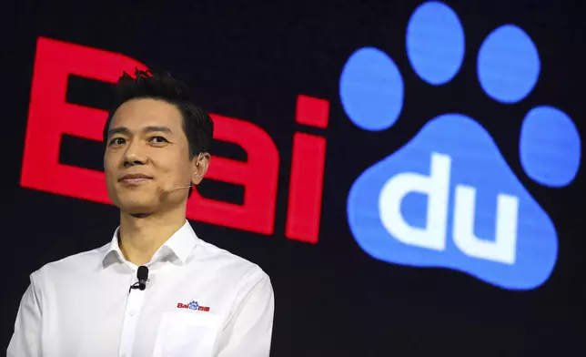 FILE - Baidu chairman and CEO Robin Li speaks during the 2018 Baidu World conference in Beijing, Thursday, Nov. 1, 2018. (AP Photo/Mark Schiefelbein, File)