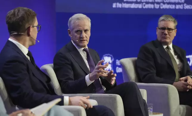 FILE - From left, Estonian Prime Minister Kristen Michal, Norwegian Prime Minister Jonas Gahr Store and British Prime Minister Keir Starmer attend a public discussion during the Joint Expeditionary Force Leaders' Summit in Tallinn, Estonia, on Dec. 16, 2024. (AP Photo/Sergei Grits, File)