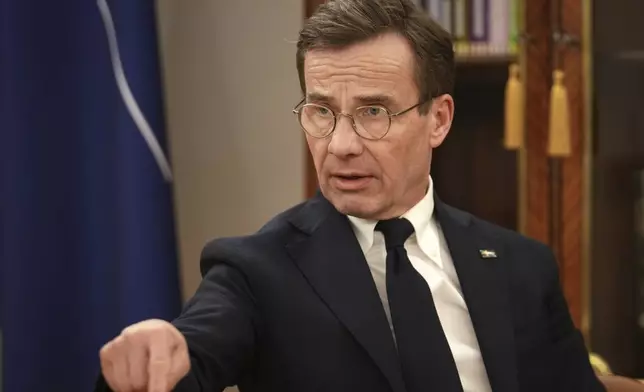 Sweden Prime Minister Ulf Kristersson speaks to the Associated Press during an interview at the Estonian Knighthood House in Tallinn, Estonia, on Dec. 17, 2024. (AP Photo/Sergei Grits)