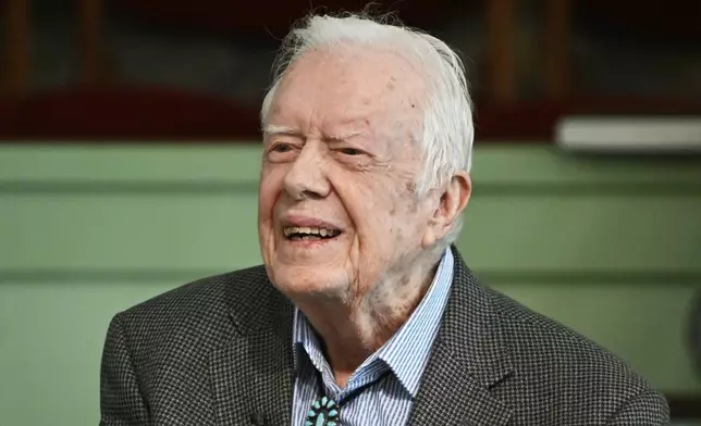 FILE - Former President Jimmy Carter teaches Sunday school at Maranatha Baptist Church in Plains, Ga., on Nov. 3, 2019. (AP Photo/John Amis, File)