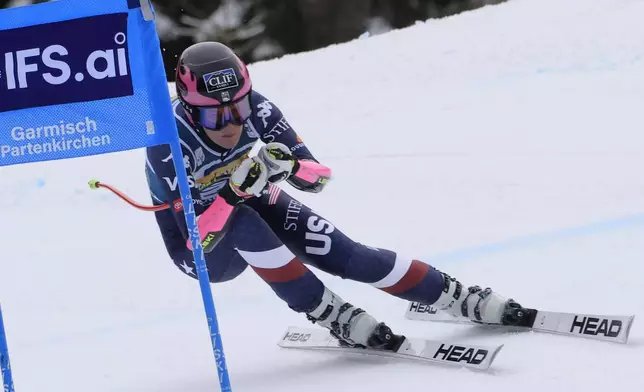 United States' Keely Cashman speeds down the course during an alpine ski, women's World Cup super G, in Garmisch, Germany, Sunday, Jan. 26, 2025. (AP Photo/Giovanni Maria Pizzato)
