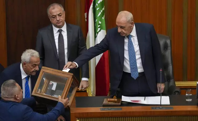 Lebanese Parliament Speaker Nabih Berri, right, casts his vote to elect a new president, at the parliament building in downtown Beirut, Lebanon, Thursday, Jan. 9, 2025. (Lebanese Parliament media office via AP)