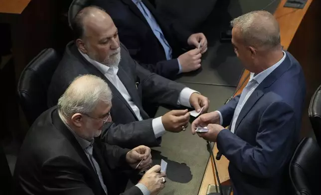 Hezbollah's parliamentary bloc members attend a parliamentary session to elect a new president, at the parliament building in downtown Beirut, Lebanon, Thursday, Jan. 9, 2025. (AP Photo/Hussein Malla)