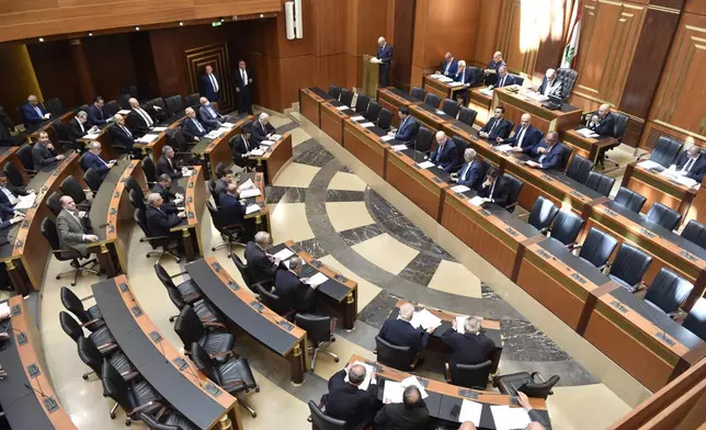 FILE - In this photo released by the Lebanese Parliament media office, Lebanese lawmakers attending a parliament session, in Beirut, Lebanon, April 18, 2023. (Hassan Ibrahim/Lebanese Parliament media office via AP, File)