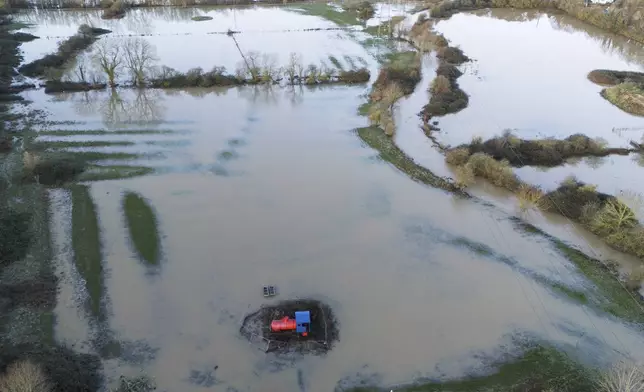 Flooded fields are seen in Glen Parva, Leicester, England, Tuesday, Jan. 7, 2025. (Gareth Fuller/PA via AP)