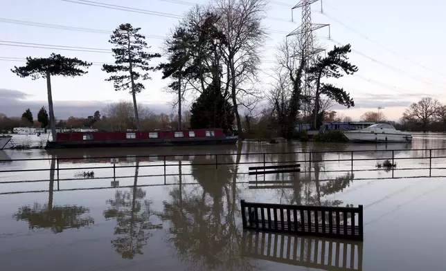 Flooded banks of the river Soar in Barrow Upon Soar, England, Tuesday, Jan. 7, 2025.(AP Photo/Darren Staples)