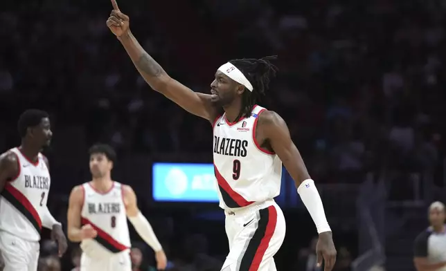 Portland Trail Blazers forward Jerami Grant (9) reacts during the second half of an NBA basketball game against the Miami Heat, Tuesday, Jan. 21, 2025, in Miami. (AP Photo/Lynne Sladky)