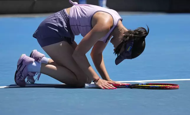 Eva Lys of Germany celebrates after defeating Jaqueline Cristian of Romania in their third round match at the Australian Open tennis championship in Melbourne, Australia, Saturday, Jan. 18, 2025. (AP Photo/Vincent Thian)