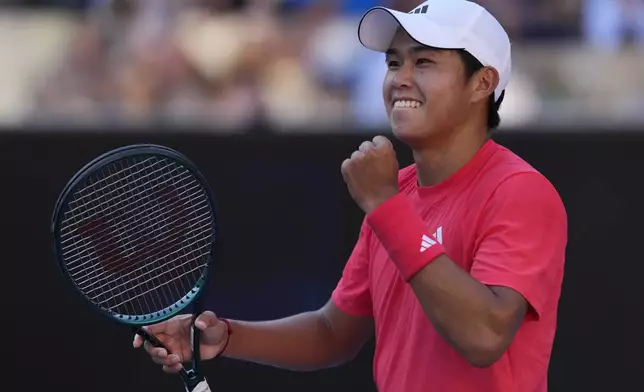 Learner Tien of the U.S. celebrates after defeating Corentin Moutet of France in their third round match at the Australian Open tennis championship in Melbourne, Australia, Saturday, Jan. 18, 2025. (AP Photo/Vincent Thian)