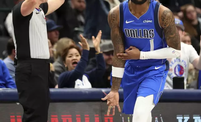 Dallas Mavericks' Jaden Hardy celebrates after a three pointer against the Portland Trail Blazers in the first half of an NBA basketball game, Thursday, Jan. 9, 2025, in Dallas. (AP Photo/Richard W. Rodriguez)