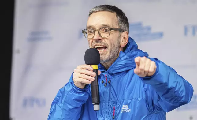 FILE -Leader of the Austrian freedom party, Herbert Kickl speaks during a demonstration against measures to battle the coronavirus pandemic in Vienna, Austria, Dec. 11, 2021. (AP Photo/Florian Schroetter, File)