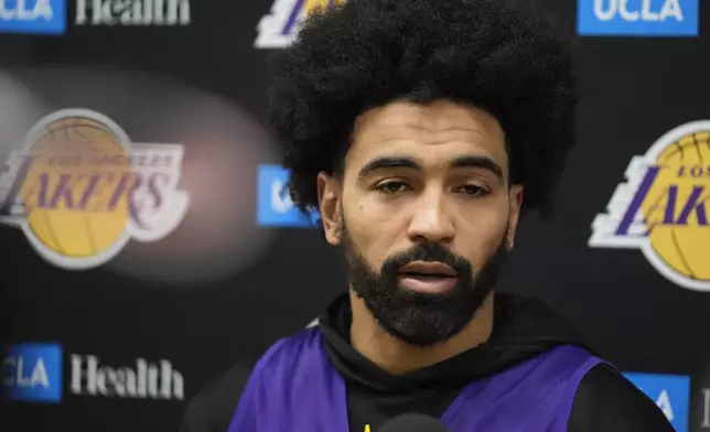 Los Angeles Lakers guard Gabe Vincent comments on the wildfires during an NBA basketball news conference at the UCLA Health Training Center in El Segundo, Calif., Friday, Jan. 10, 2025. (AP Photo/Damian Dovarganes)