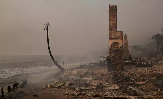 A beach front property is damaged by the Palisades Fire Thursday, Jan. 9, 2025 in Malibu, Calif. (AP Photo/Jae C. Hong)