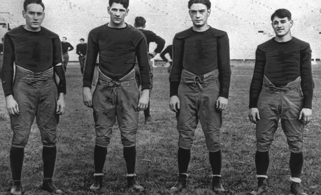 FILE - In this 1924, file photo, Notre Dame's infamous backfield, "The Four Horsemen," from left, Don Miller, Elmer Layden, Jim Crowley and Harry Stuhldreherare pose on the practice field in South Bend, Ind. (AP Photo/File)