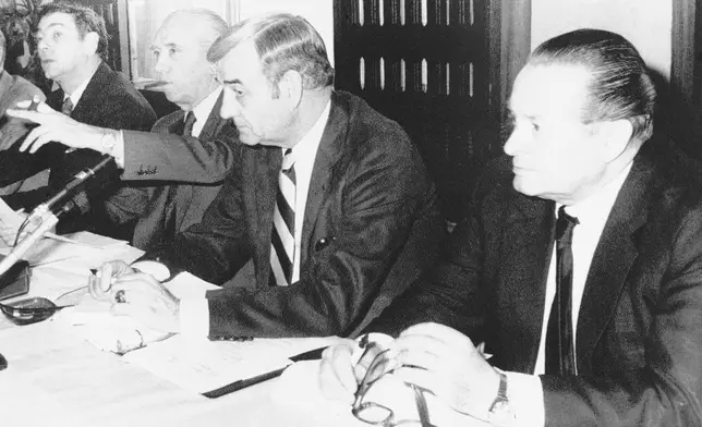 FILE - From left, Belgian representative to the International Olympic Committee (IOC), Prince Alexandre de Merode, President of the Belgian Olympic Committee Raoul Mollet, General Secretary of the U.S. Olympic Committee Col. F. Don Miller, and President of the West German Olympic Committee Willi Daume, are seen during a meeting of officials from 18 Western European Olympic committees to discuss a possible boycott of the MOscow Olympic games on March 22, 1980, in Brussels. (AP Photo/Pierre Thielemans, File)