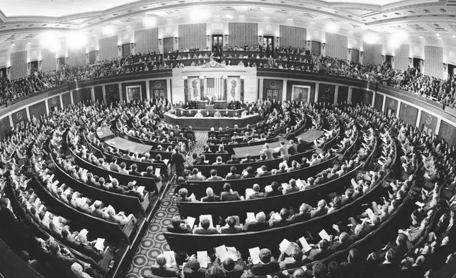 FILE - A wide-angle lens captures the assembled members of Congress in the House Chamber for Carter's State of The Union address in Washington on Jan. 23, 1980. (AP Photo, File)