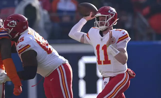 Kansas City Chiefs quarterback Carson Wentz throws during the first half of an NFL football game against the Denver Broncos Sunday, Jan. 5, 2025, in Denver. (AP Photo/David Zalubowski)