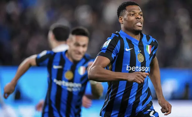 Inter Milan's Denzel Dumfries celebrates after scoring his second goal during the Italian Super Cup semifinal soccer match between Inter Milan and Atlanta at Al Awwal Park stadium in Riyadh, Saudi Arabia, Thursday, Jan. 2, 2025. (AP Photo/Altaf Qadri)