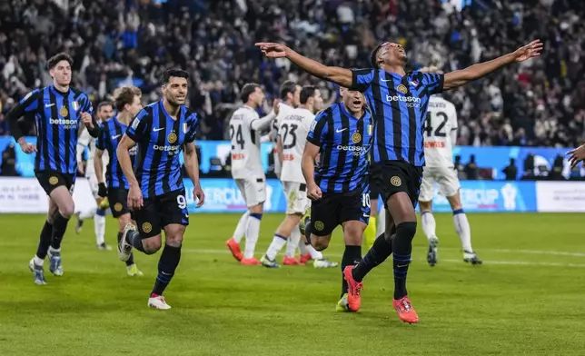 Inter Milan's Denzel Dumfries celebrates after scoring the opening goal during the Italian Super Cup semifinal soccer match between Inter Milan and Atlanta at Al Awwal Park stadium in Riyadh, Saudi Arabia, Thursday, Jan. 2, 2025. (AP Photo/Altaf Qadri)