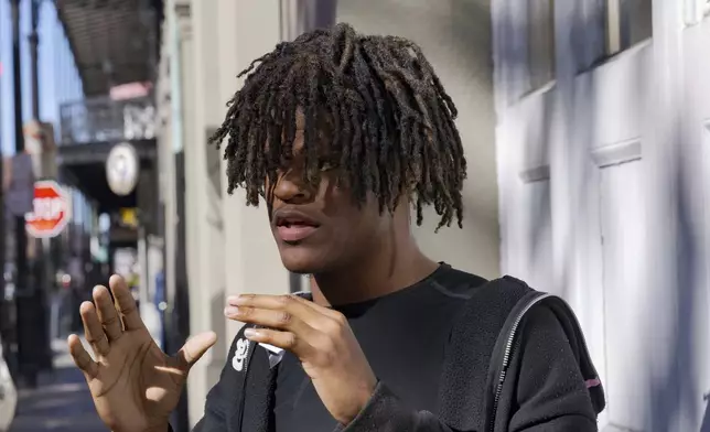 Zion Parsons, 18, talks about the death of his friend, Nikyra Dedeaux, 18, and the scene after a pickup truck crashed into pedestrians on Bourbon Street followed by a shooting in the French Quarter in New Orleans, Wednesday, Jan. 1, 2025. (AP Photo/Matthew Hinton)