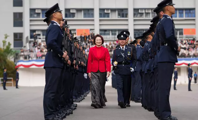 NPC Standing Committee member inspects passing-out parade at HK Police College  Source: HKSAR Government Press Releases