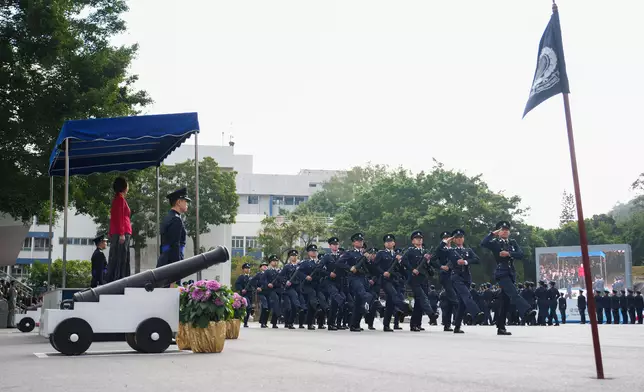 NPC Standing Committee member inspects passing-out parade at HK Police College  Source: HKSAR Government Press Releases