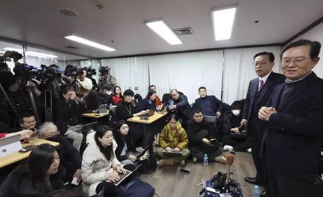 Seok Dong-hyeon and Yoon Kab-keun, right, lawyers for South Korea's impeached President Yoon Suk Yeol, attend a press conference in Seoul, South Korea, Thursday, Jan. 9, 2025. (Lee Jin-wook/Yonhap via AP)