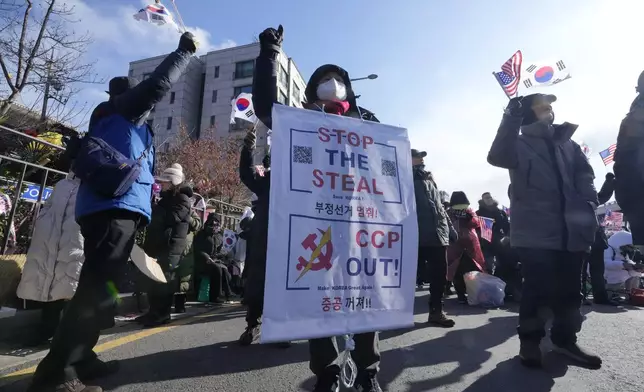 Supporters of impeached South Korean President Yoon Suk Yeol attend a rally to oppose his impeachment near the presidential residence in Seoul, South Korea, Thursday, Jan. 9, 2025. (AP Photo/Ahn Young-joon)