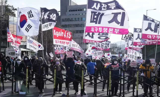 Supporters of impeached South Korean President Yoon Suk Yeol stage a rally to oppose his impeachment near the presidential residence in Seoul, South Korea, Thursday, Jan. 9, 2025. (AP Photo/Ahn Young-joon)