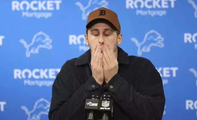 Detroit Lions quarterback Jared Goff talks to the media after an NFL football divisional playoff game against the Washington Commanders, Sunday, Jan. 19, 2025, in Detroit. (AP Photo/Mike Mulholland)