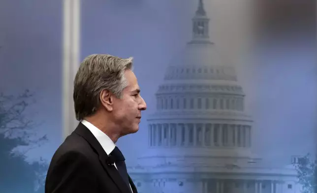 Secretary of State Antony Blinken enters before delivering remarks at the Atlantic Council, Tuesday, Jan. 14, 2025, in Washington. (AP Photo/Luis M. Alvarez)