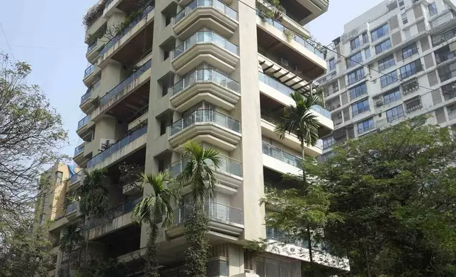 The residential building that houses the home of Bollywood actor Saif Ali Khan where he was stabbed following a scuffle with an intruder in Mumbai, Thursday, Jan. 16, 2025. (AP Photo/Rajanish Kakade)