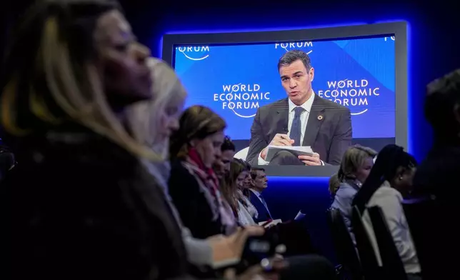 Prime Minister of Spain Pedro Sanchez speaks at the Annual Meeting of World Economic Forum in Davos, Switzerland, Wednesday Jan. 22, 2025. (AP Photo/Markus Schreiber)