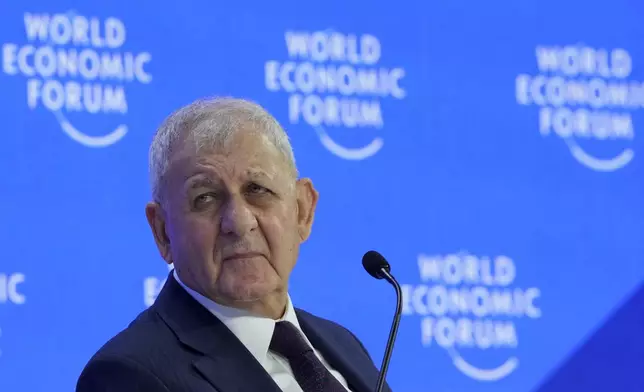 President of Iraq Abdul Latif Rashid attends the Annual Meeting of World Economic Forum in Davos, Switzerland, Thursday, Jan. 23, 2025. (AP Photo/Markus Schreiber)