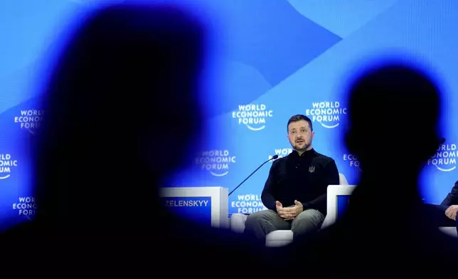 Ukrainian President Volodymyr Zelenskyy speaks at the Annual Meeting of World Economic Forum in Davos, Switzerland, Tuesday, Jan. 21, 2025. (AP Photo/Markus Schreiber)