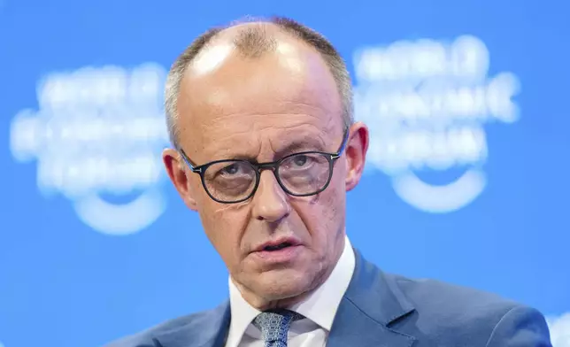 German opposition leader and chairman of the Christian Democratic Union party Friedrich Merz attends the Annual Meeting of World Economic Forum in Davos, Switzerland, Tuesday, Jan. 21, 2025. (AP Photo/Markus Schreiber)